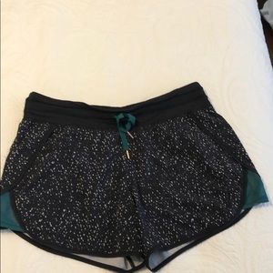 Black speckle w/green trim lululemon shorts, 12